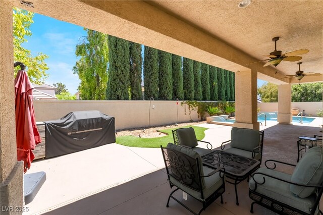view of patio / terrace with a fenced backyard, a ceiling fan, a fenced in pool, and a grill