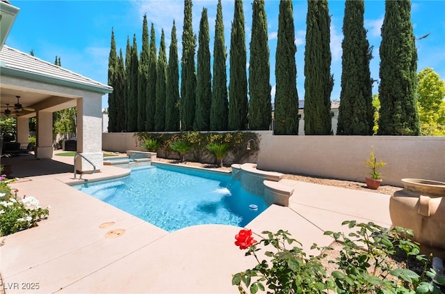 view of swimming pool featuring a fenced backyard, a fenced in pool, a patio, and ceiling fan