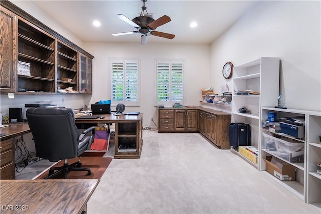 home office featuring recessed lighting, ceiling fan, and light carpet