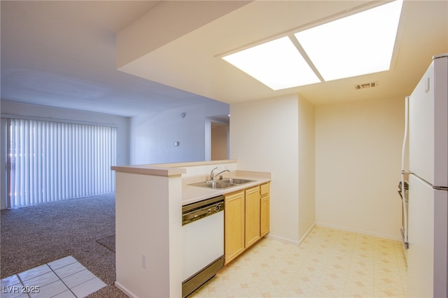 8070 W Russell Rd Unit 1028, Las Vegas, NV 89113 - kitchen featuring white appliances, light floors, a peninsula, open floor plan, and light countertops