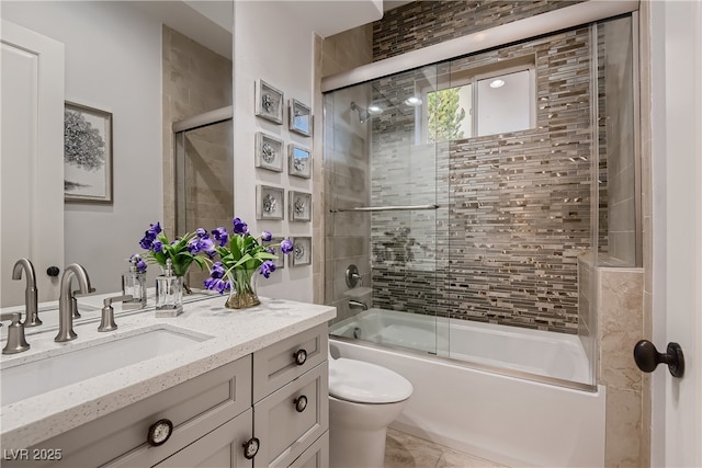 17 Grand Corniche Dr, Henderson, NV 89011 - bathroom with vanity, toilet, and shower / bath combination with glass door