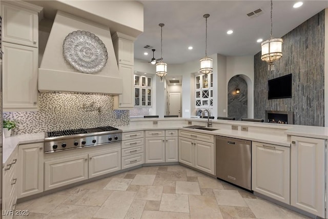 17 Grand Corniche Dr, Henderson, NV 89011 - kitchen with visible vents, custom exhaust hood, recessed lighting, a sink, and stainless steel appliances