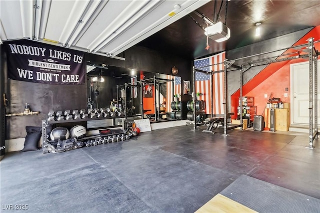 exercise room with a garage