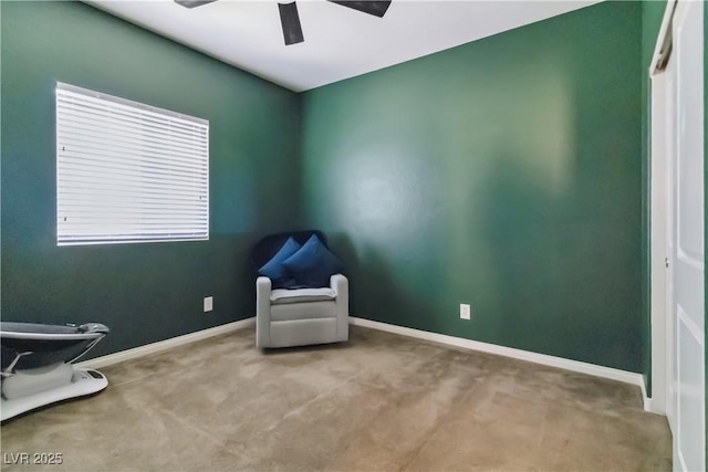unfurnished room with a ceiling fan, carpet flooring, and baseboards