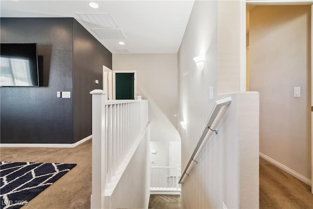 stairs with carpet and baseboards