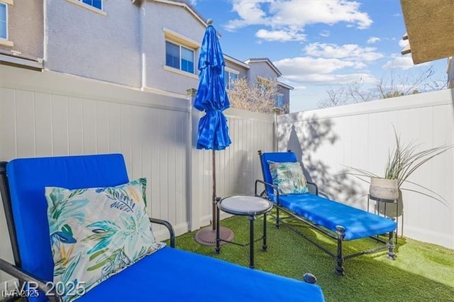 4465 Shimmering Skies St Unit 1177, North Las Vegas, NV 89031 - view of patio featuring fence