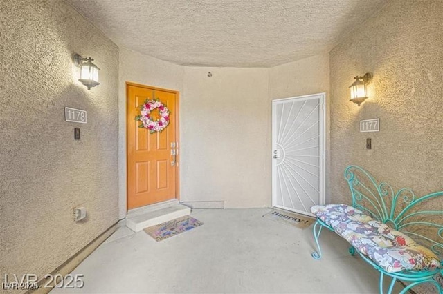 4465 Shimmering Skies St Unit 1177, North Las Vegas, NV 89031 - view of exterior entry featuring stucco siding