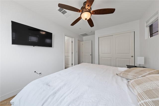 2606 Marvel Astoria St, Henderson, NV 89044 - bedroom with baseboards, visible vents, ceiling fan, and a closet