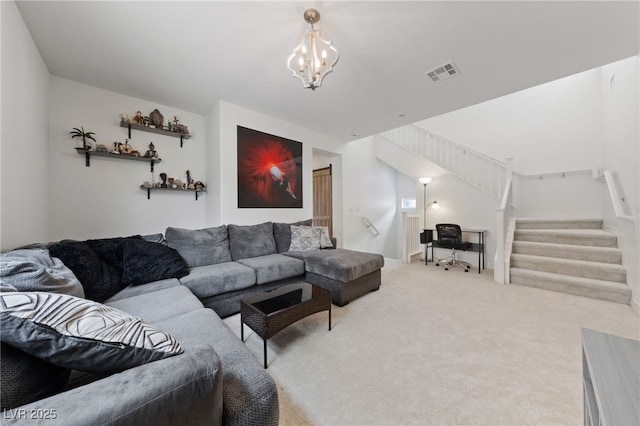 2606 Marvel Astoria St, Henderson, NV 89044 - living room with stairway, an inviting chandelier, carpet, and visible vents
