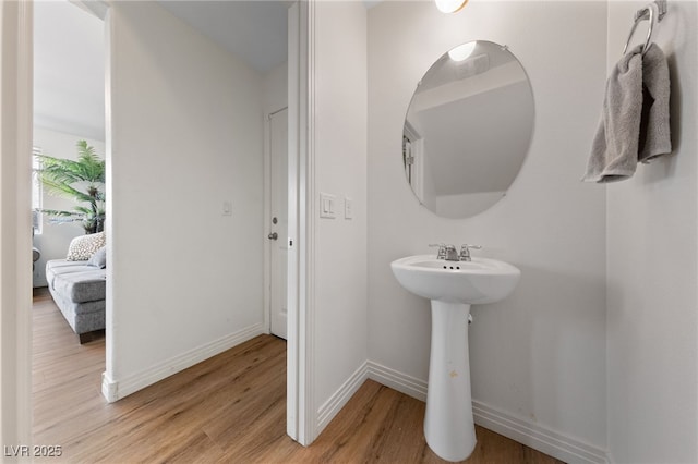 2606 Marvel Astoria St, Henderson, NV 89044 - bathroom featuring baseboards and wood finished floors