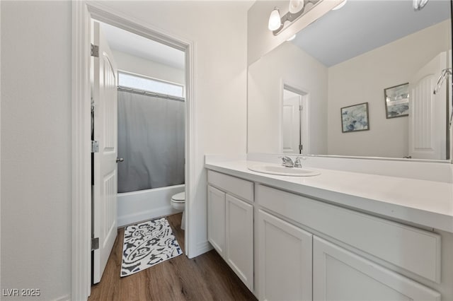 2606 Marvel Astoria St, Henderson, NV 89044 - full bathroom with toilet, wood finished floors, shower / tub combo with curtain, and vanity