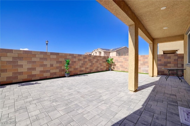 242 Polaris Ridge Ave, Henderson, NV 89011 - view of patio featuring a fenced backyard
