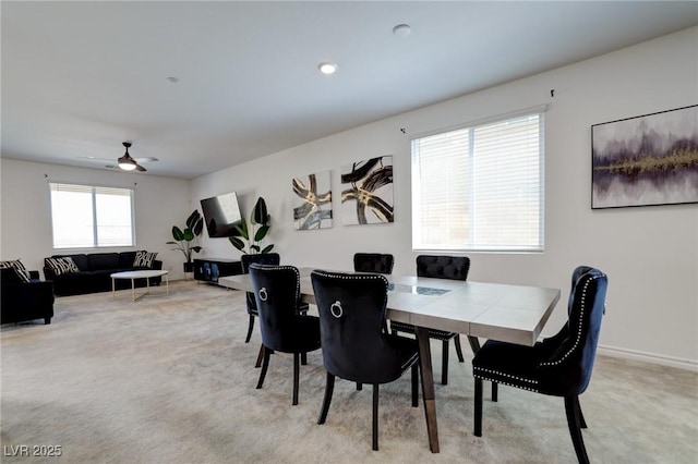 242 Polaris Ridge Ave, Henderson, NV 89011 - dining space with light colored carpet and a ceiling fan