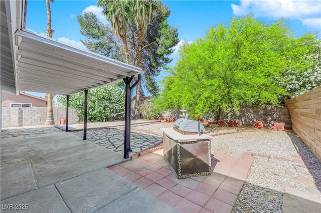 view of patio featuring a fenced backyard