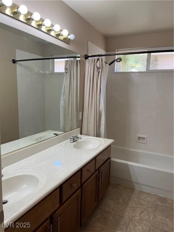 10974 Fintry Hills St, Las Vegas, NV 89141 - full bathroom with a sink, shower / bath combo, and double vanity
