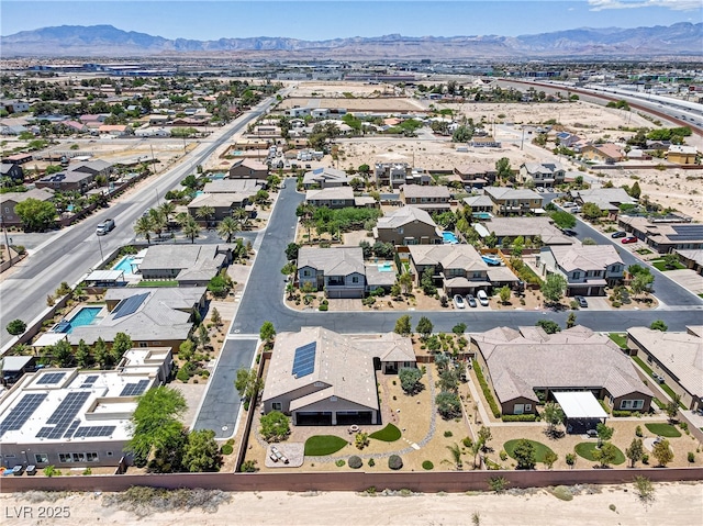 birds eye view of property featuring a residential view and a mountain view
