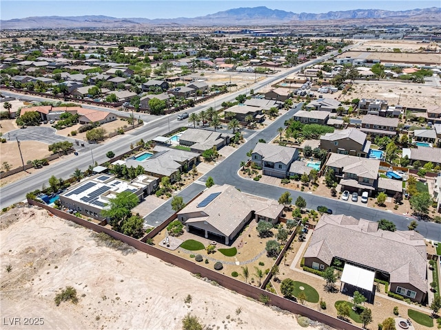 aerial view with a residential view and a mountain view
