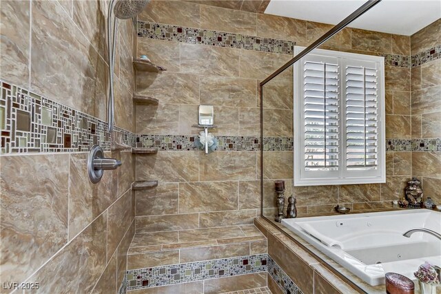 full bath featuring a whirlpool tub and tiled shower