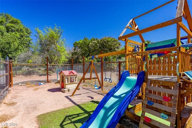 view of jungle gym with fence