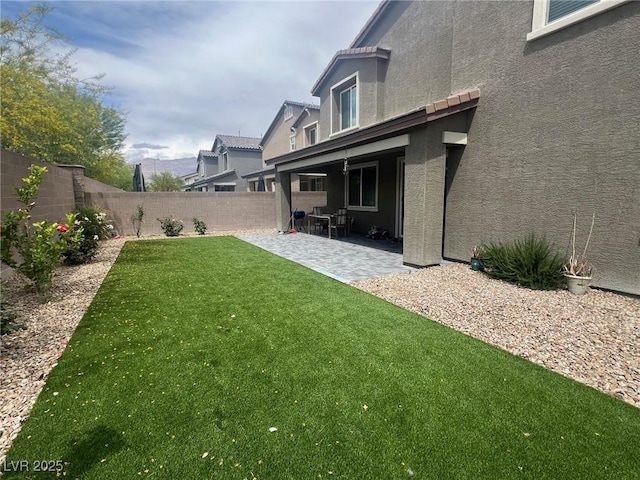 7527 Ardenno St, North Las Vegas, NV 89084 - view of yard with a patio