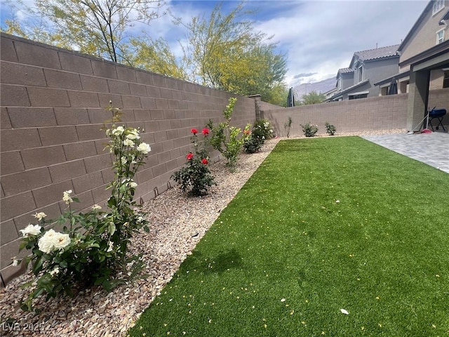 7527 Ardenno St, North Las Vegas, NV 89084 - view of yard featuring a patio area