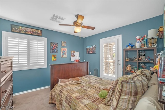 bedroom with visible vents, carpet, ceiling fan, and baseboards