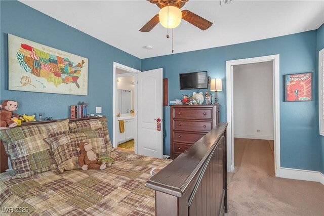 carpeted bedroom featuring baseboards and a ceiling fan