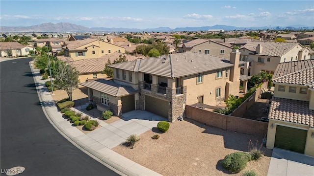 aerial view featuring a residential view and a mountain view