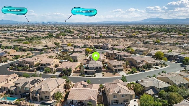 aerial view with a residential view and a mountain view