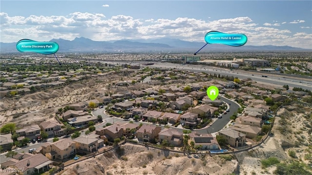 aerial view with a residential view and a mountain view