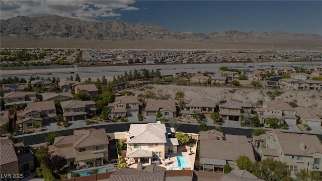 aerial view with a residential view and a mountain view