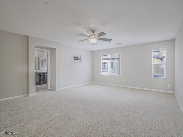 1525 Spiced Wine Ave Unit 19103, Henderson, NV 89074 - unfurnished room with a ceiling fan, baseboards, light colored carpet, and visible vents