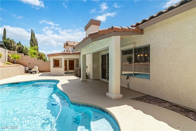 view of pool featuring a fenced in pool, a patio area, and fence