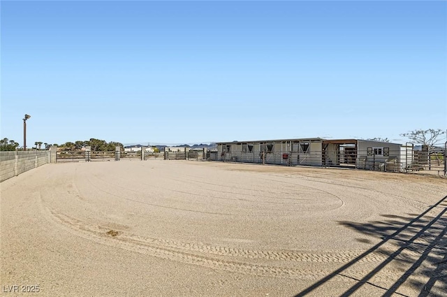 view of home's community with fence
