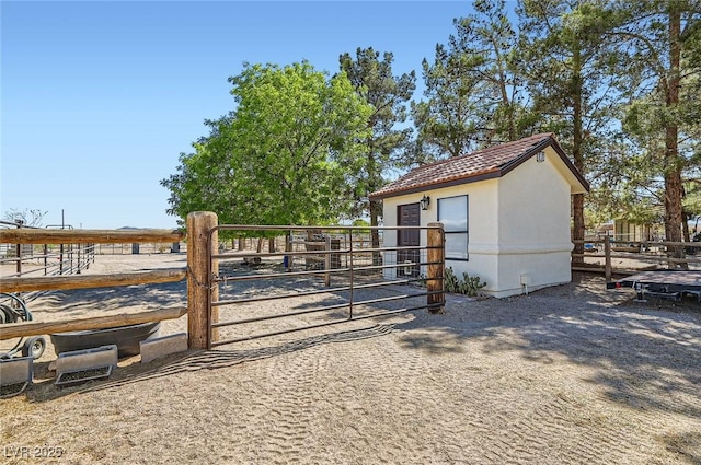 exterior space featuring an exterior structure and an outbuilding