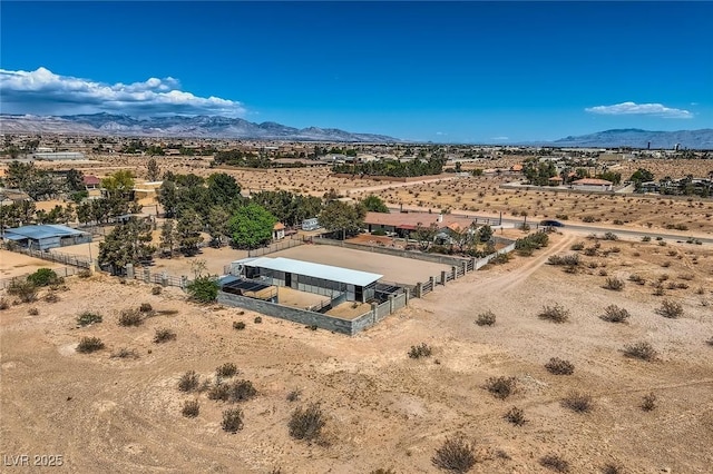 bird's eye view with a desert view, a mountain view, and a rural view