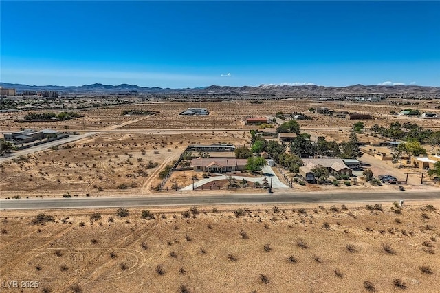 bird's eye view with a rural view, a mountain view, and a desert view