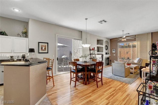 130 Twin Towers Ave, Las Vegas, NV 89123 - dining room with light wood-type flooring, visible vents, and ceiling fan