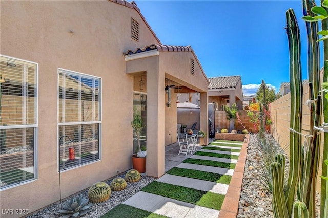 view of yard with a patio and a fenced backyard