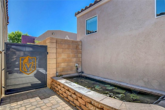 details with fence and stucco siding