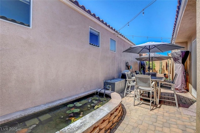 view of patio / terrace featuring outdoor dining area