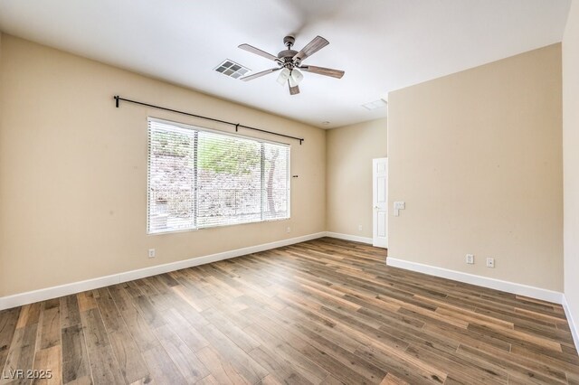 35 Glade Water Dr, Henderson, NV 89052 - unfurnished room with ceiling fan, wood finished floors, and baseboards