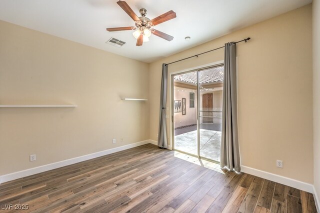 35 Glade Water Dr, Henderson, NV 89052 - unfurnished room with wood finished floors, ceiling fan, and baseboards