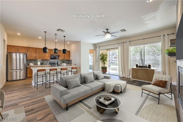 35 Glade Water Dr, Henderson, NV 89052 - living area with wood finished floors, recessed lighting, and a ceiling fan