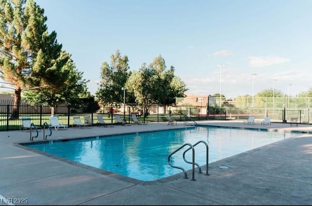 3789 Heritage Ave, Las Vegas, NV 89121 - community pool with fence and a patio