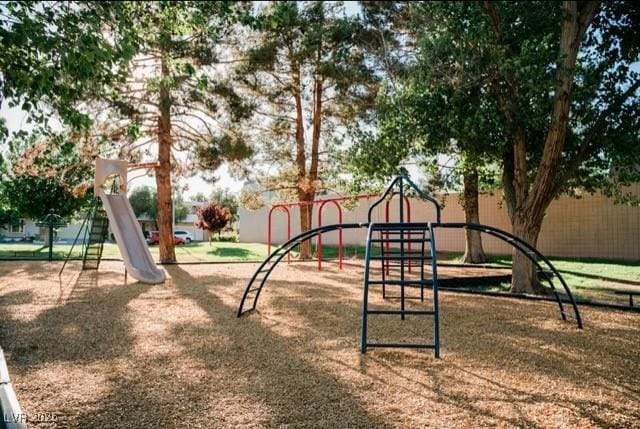 3789 Heritage Ave, Las Vegas, NV 89121 - community jungle gym with fence