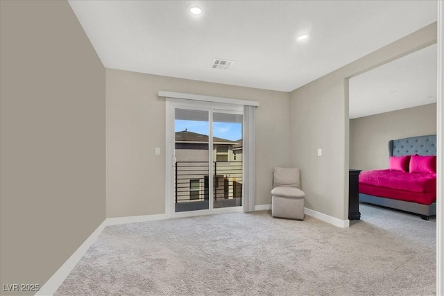sitting room featuring carpet floors, recessed lighting, baseboards, and visible vents