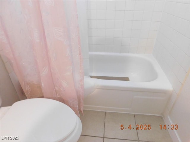 full bath featuring a tub, tile patterned floors, toilet, and curtained shower