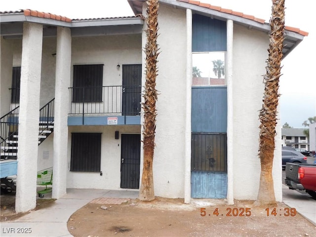 view of building exterior with stairs