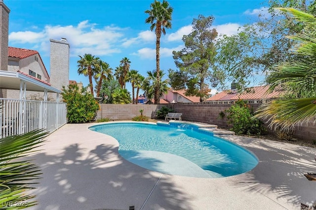 view of pool featuring a patio, a fenced in pool, and a fenced backyard